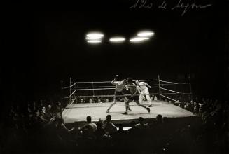 Combate de boxeo entre Martínez de Alfara y Marcel Lauriot en el teatro Olympia