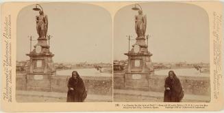 “Una limosna por el amor de Dios!” de un antiguo puente morisco sobre el Guadalquivir y Ciudad, Córdova