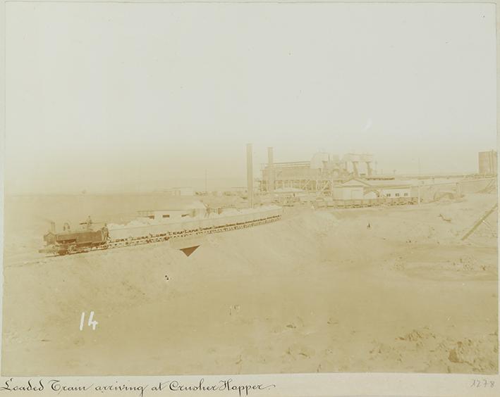 Pampa and oficina views. Loade train arriving at  crusher hopper