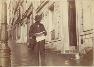 Man with Newpaper